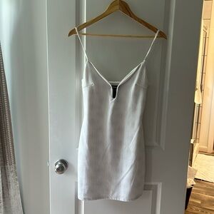 White sequined mini dress.